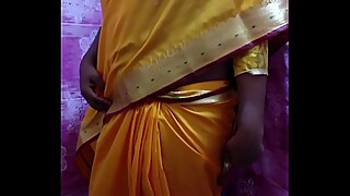 Desi Hot Girl Showing Her Assets Stripping In Saree